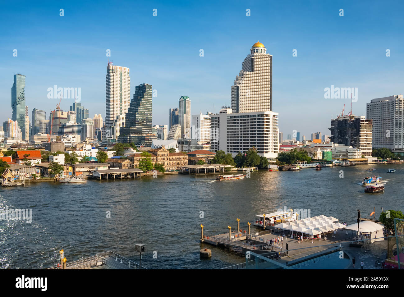 Bangkok skyline and business skyscrapers at Chaopraya river Stock Photo ...
