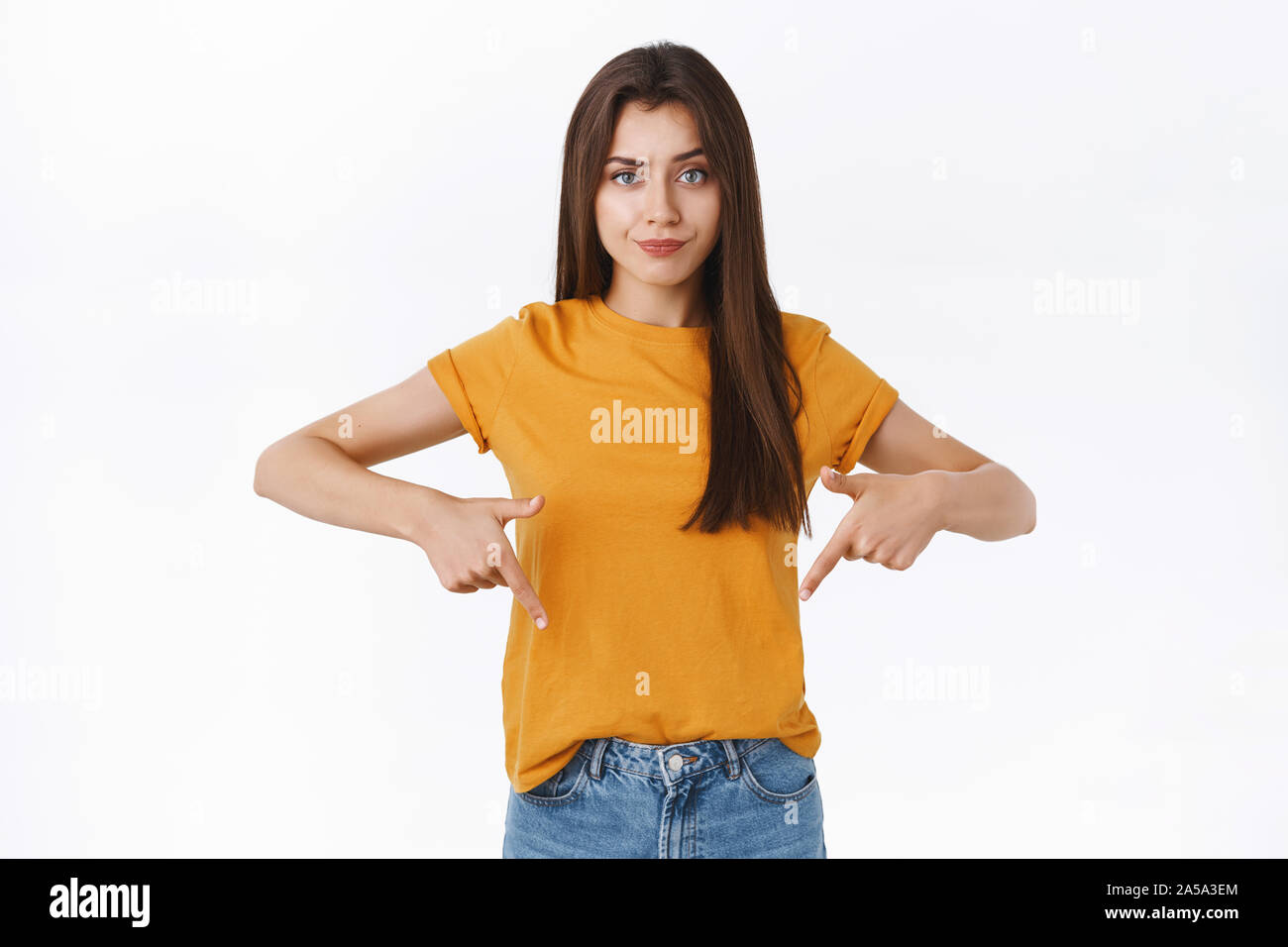 Someone Bothered Skeptical, displeased attractive moody girlfriend pointing down with ...