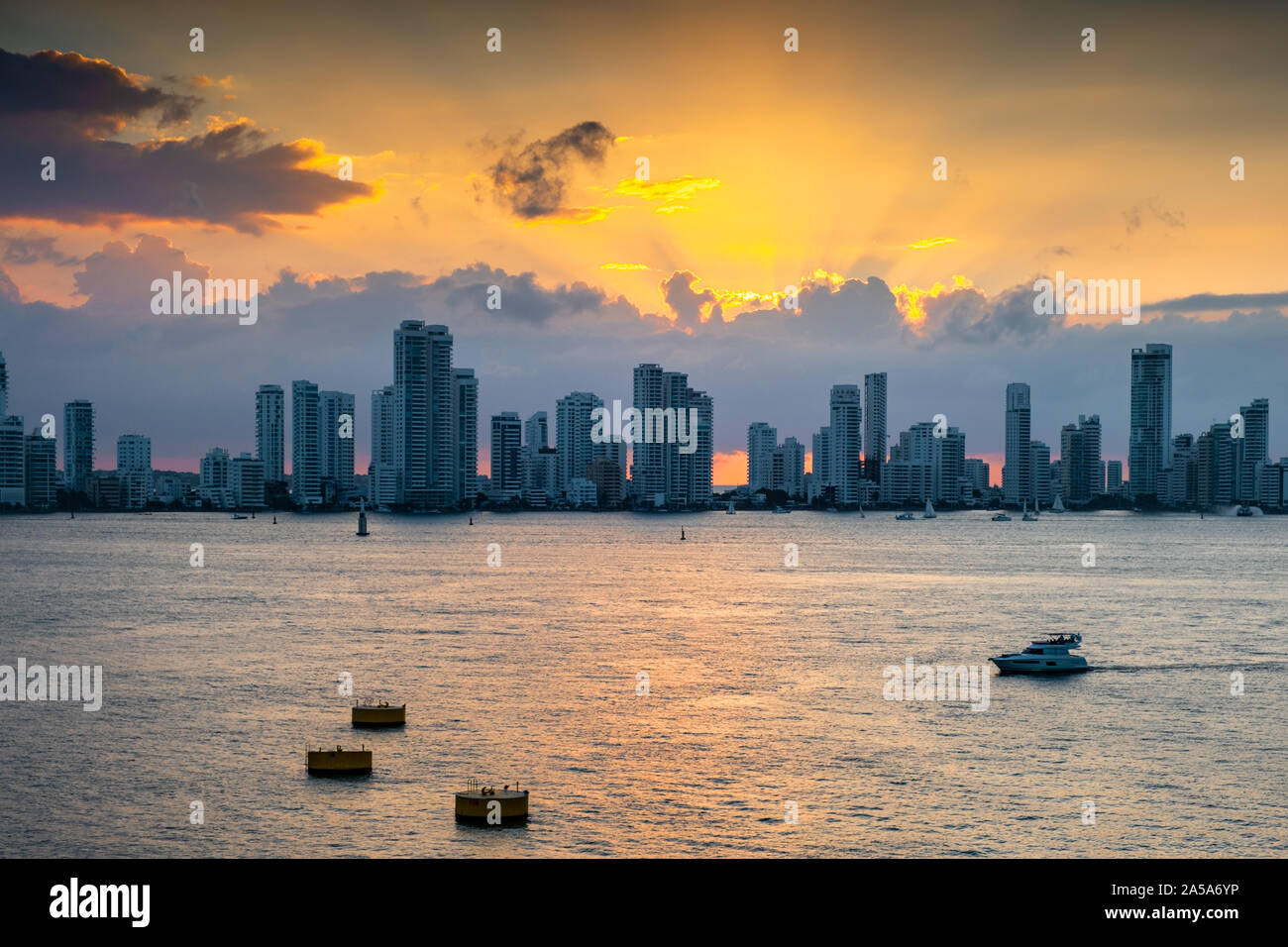 Skyline view from cruise ship leaving in the evening sunset from Cartagena Port, Colombia Stock Photo