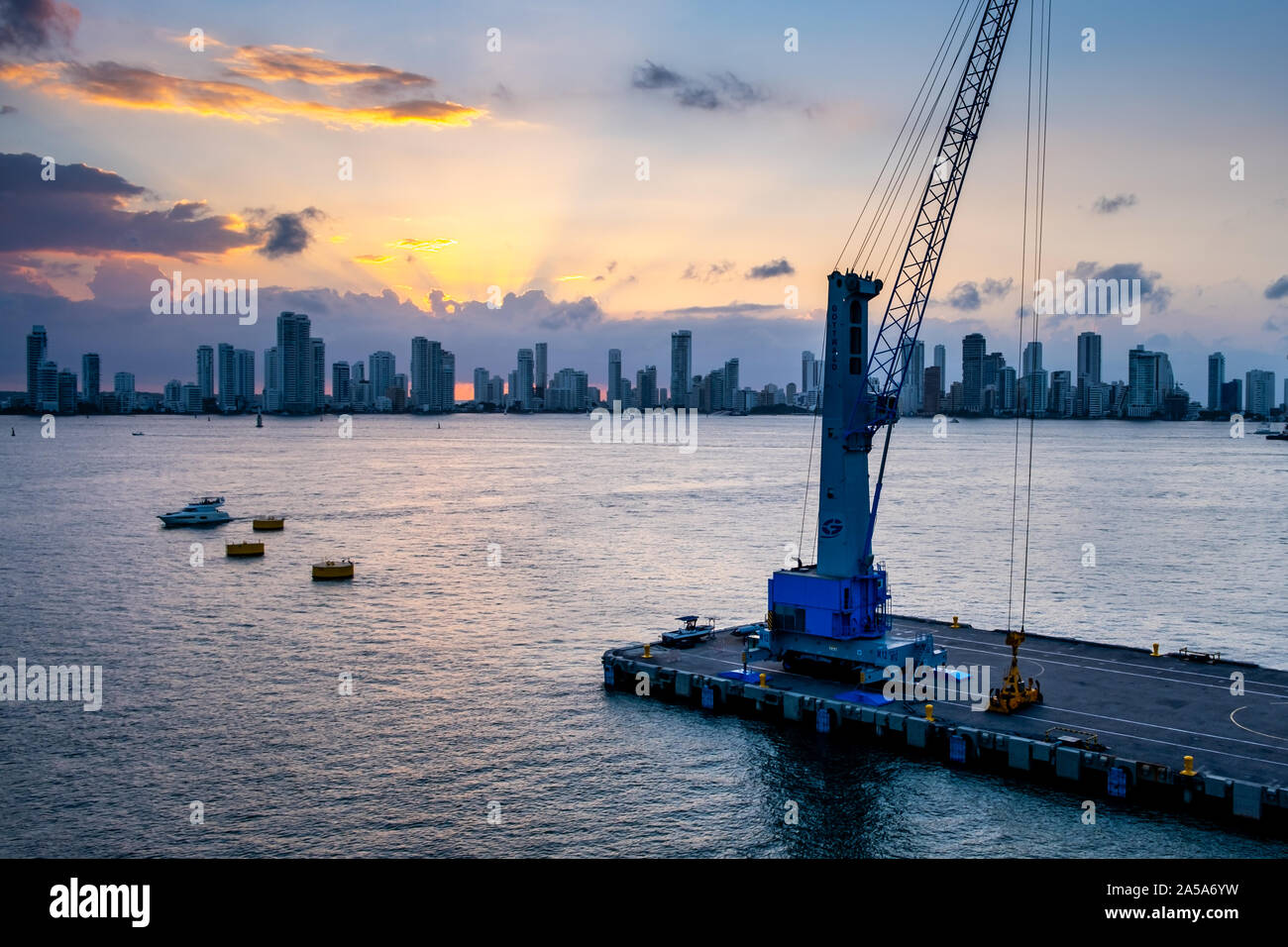 Skyline view from cruise ship leaving in the evening sunset from Cartagena Port, Colombia Stock Photo
