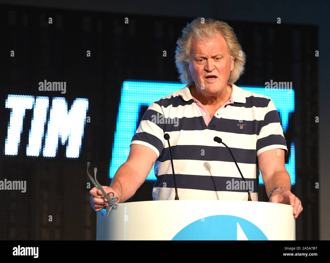 Chairman and CEO of Wetherspoons pub chain Tim Martin speaks during the Brexit Party Rally at the Queen Elizabeth II Centre, Broad Sanctuary in London. Stock Photo