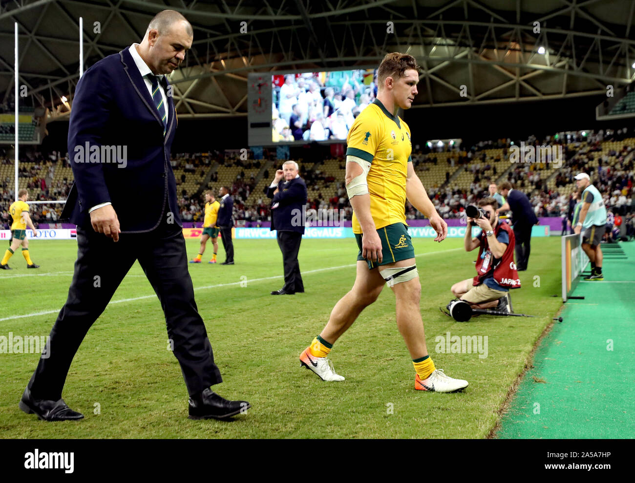 Australia Rugby Head Coach Michael Cheika (left) and Michael Hooper walk off the pitch at the