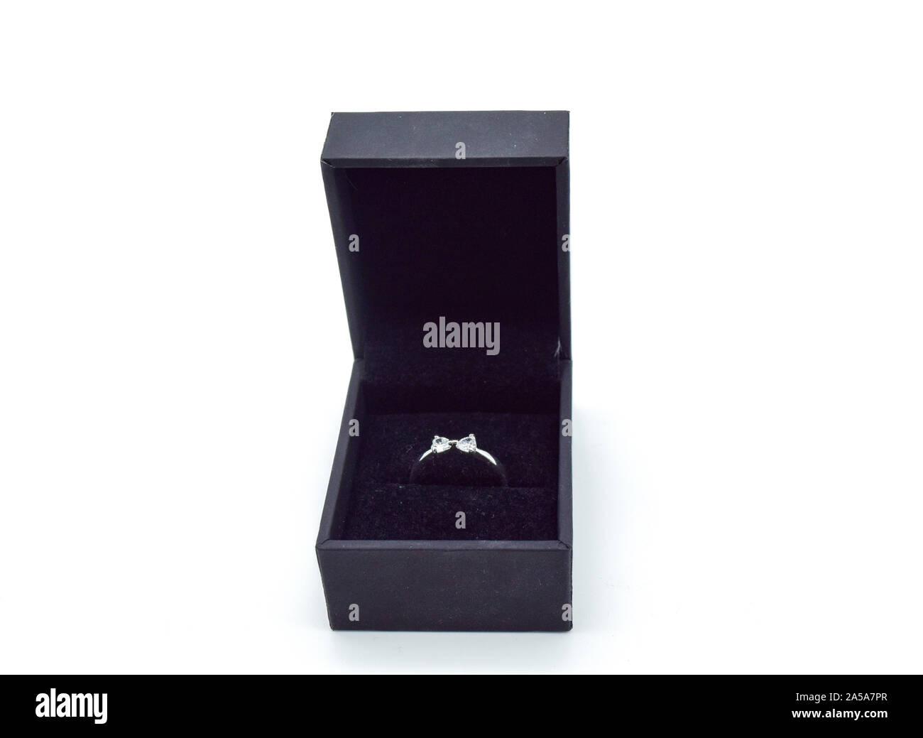 engagement ring in box isolated on white background Stock Photo - Alamy
