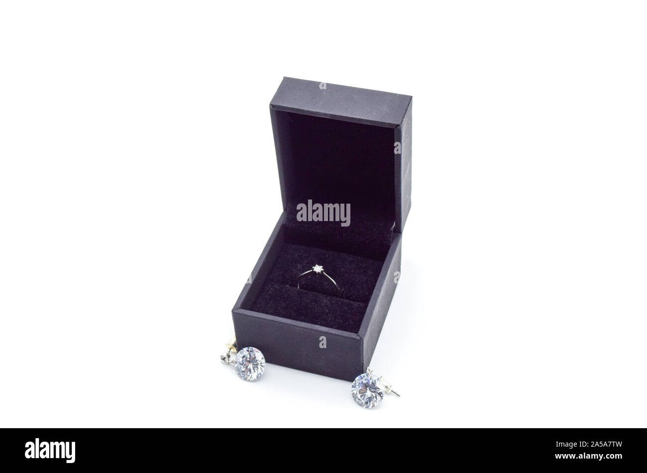 engagement ring in box isolated on white background Stock Photo - Alamy