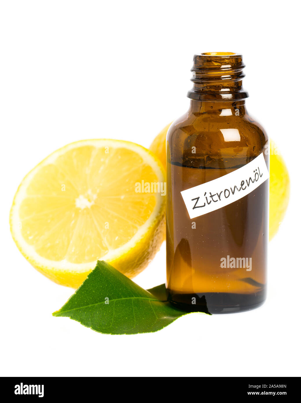 Lemon oil with lemons and leaves isolated white background Stock Photo