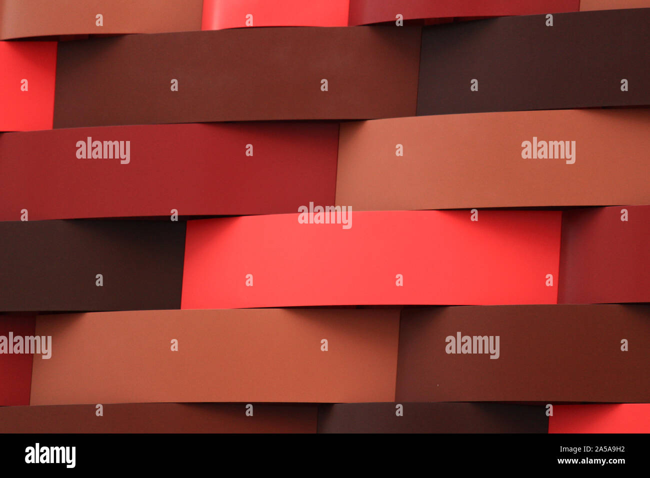 Wall of geometric pattern characterized by red gradation Stock Photo ...