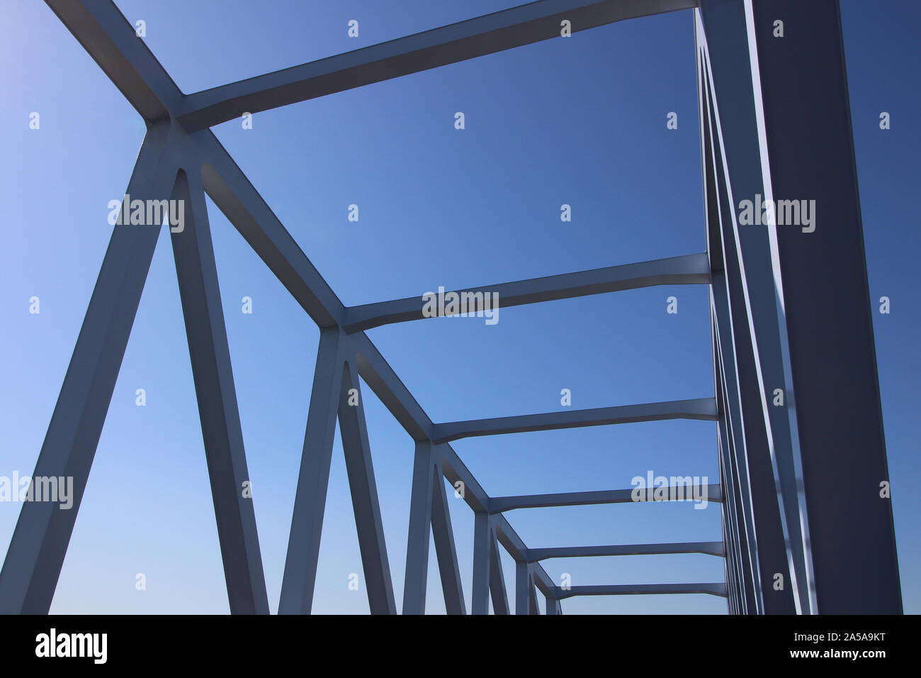 Closeup photo of a riveted steel seam of an iron bridge Stock Photo
