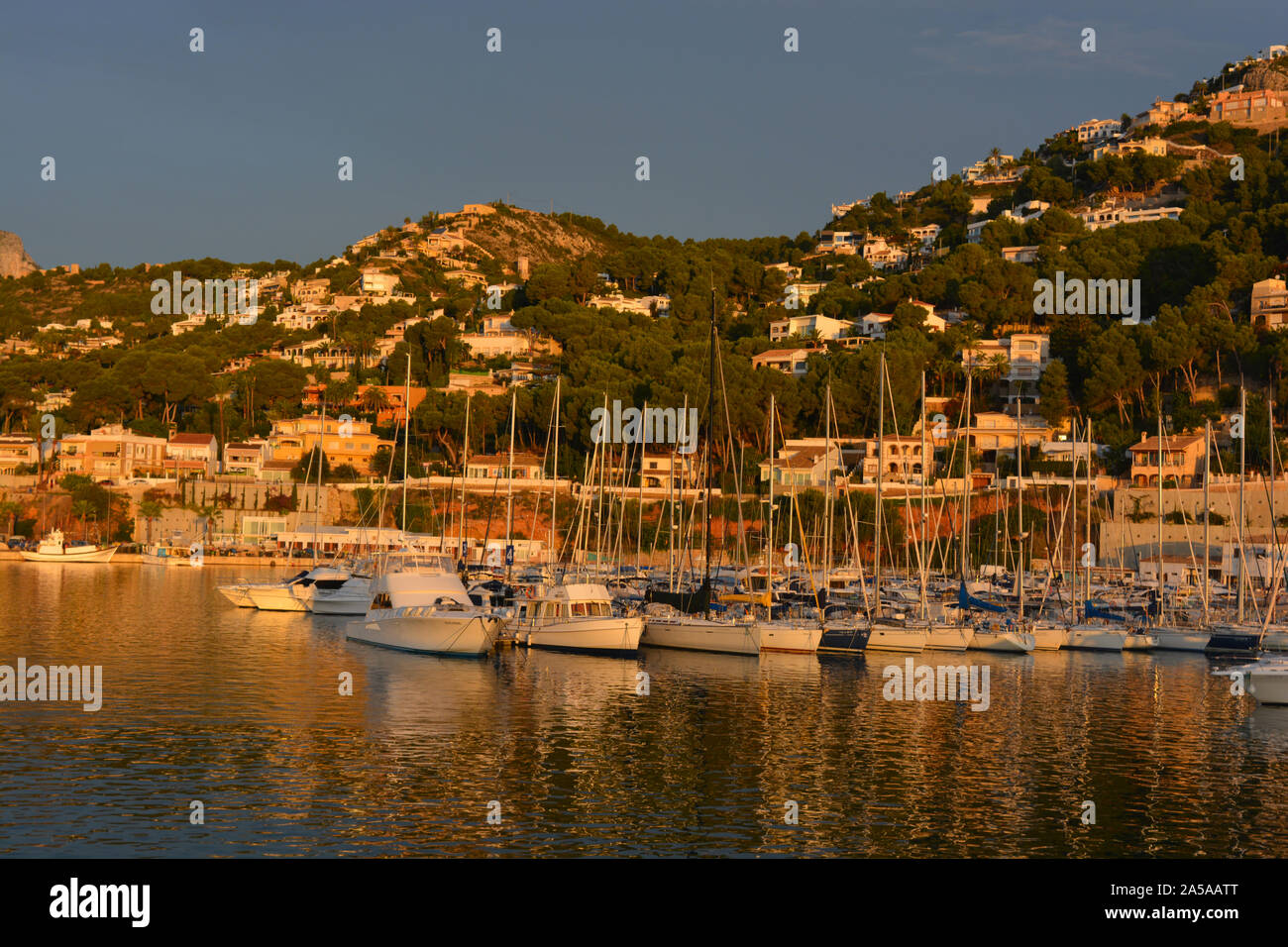Yachts moored in the marina, early morning light with Montgo mountain in the background, Javea, Xabia, Alicante Province, Valencia, Spain Stock Photo