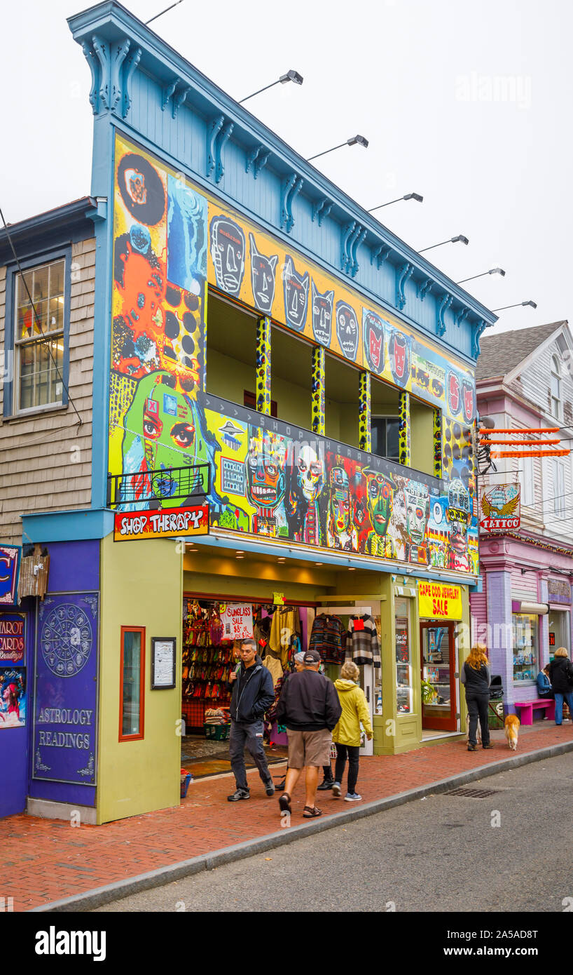 Colourful shopfront with unusual bizarre faces on a shop in Commercial Street in bohemian downtown Provincetown (P-Town), Cape Cod, New England, USA Stock Photo