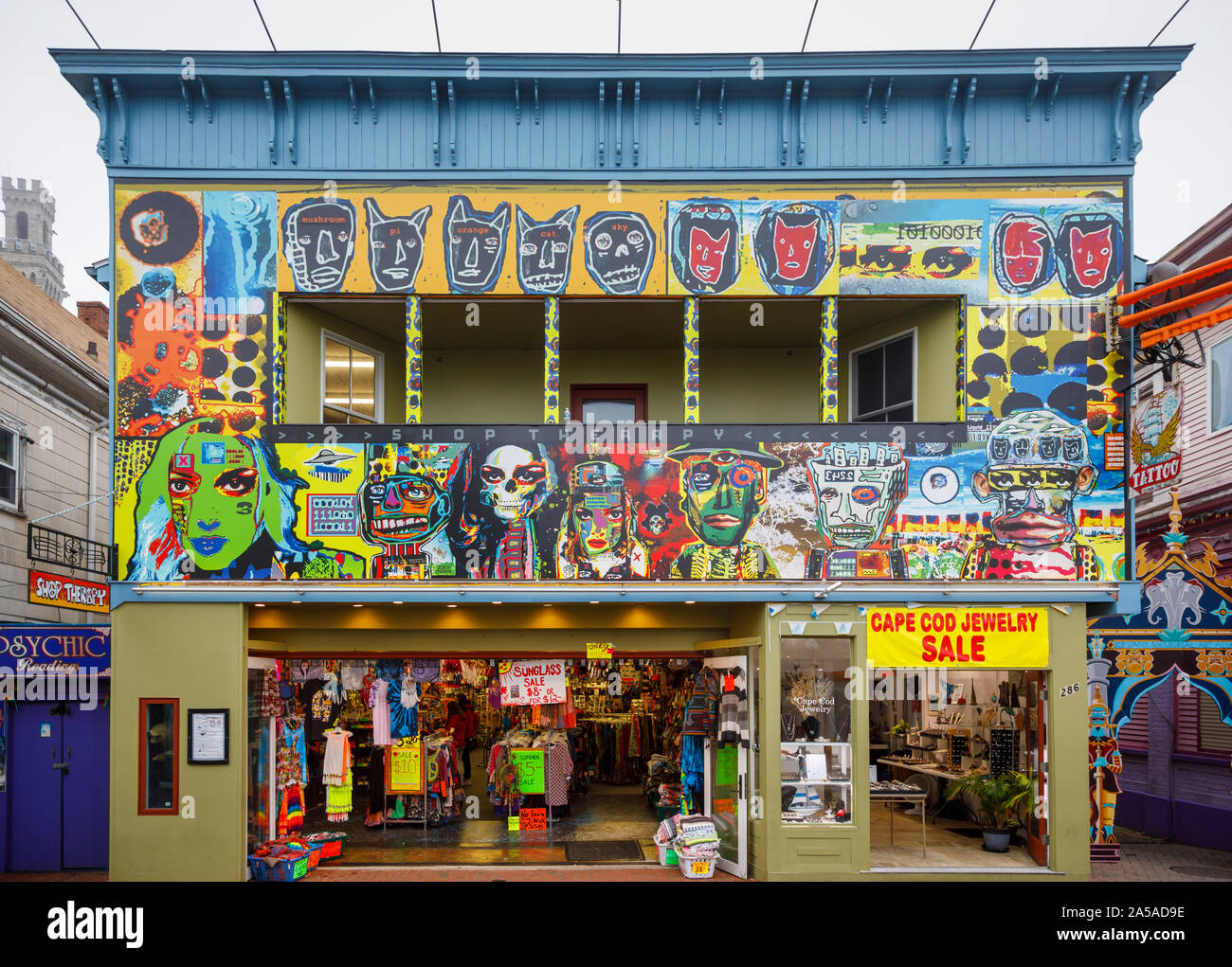 Colourful shopfront with unusual bizarre faces on a shop in Commercial Street in bohemian downtown Provincetown (P-Town), Cape Cod, New England, USA Stock Photo