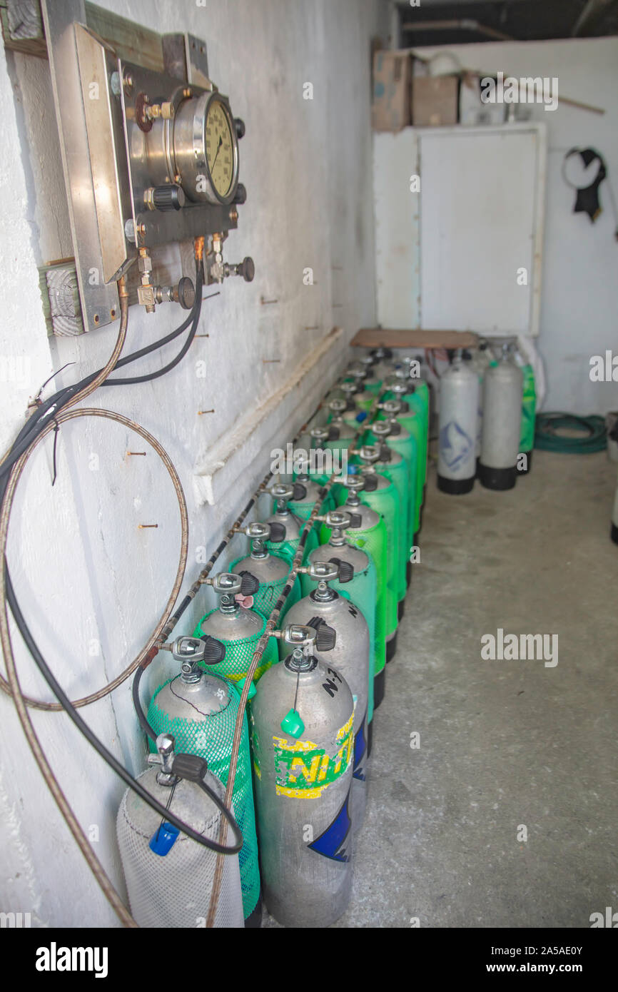 Nitrox scuba diving cylinders being filed up at Manta Ray Bay Resort, Yap, Micronesia. Stock Photo