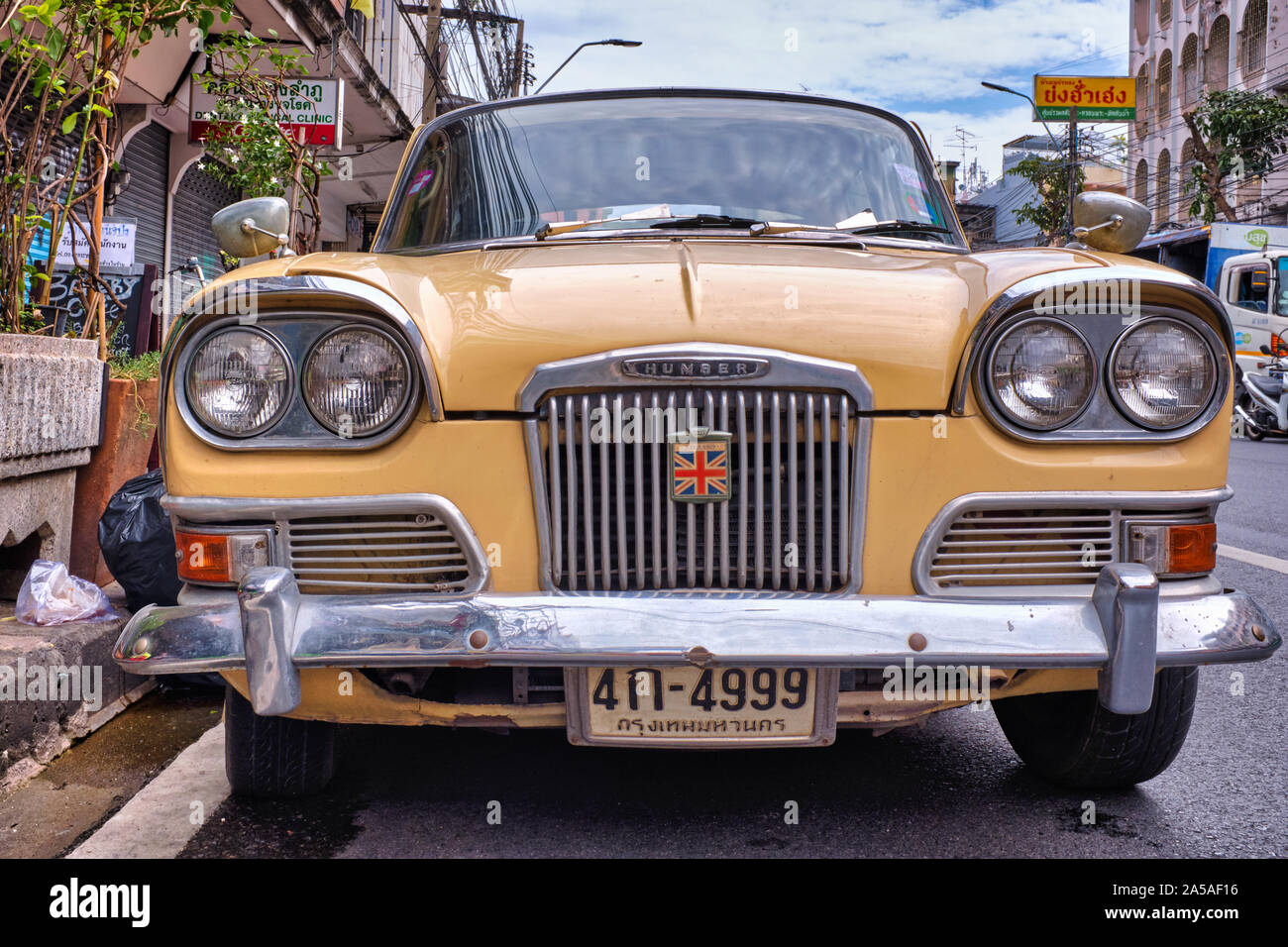 A vintage British-made Humber car from the 1960s parked in a street in Bangkok, Thailand Stock Photo
