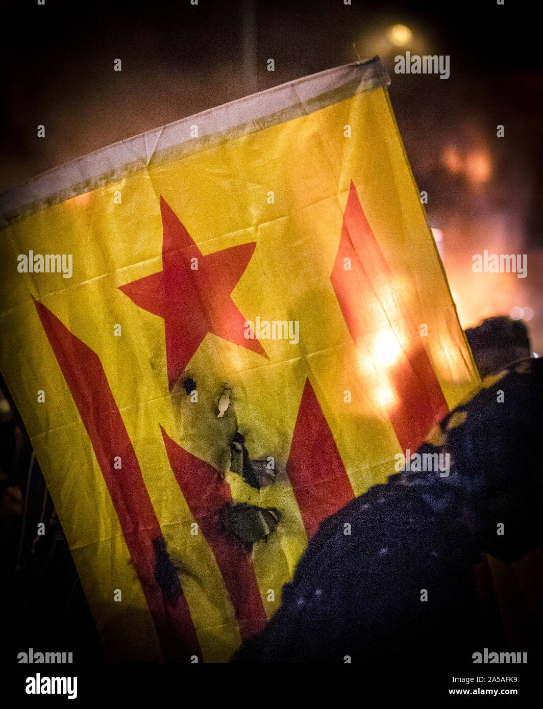 Riots in Barcelona october 18. Burnt independence flag against the ...