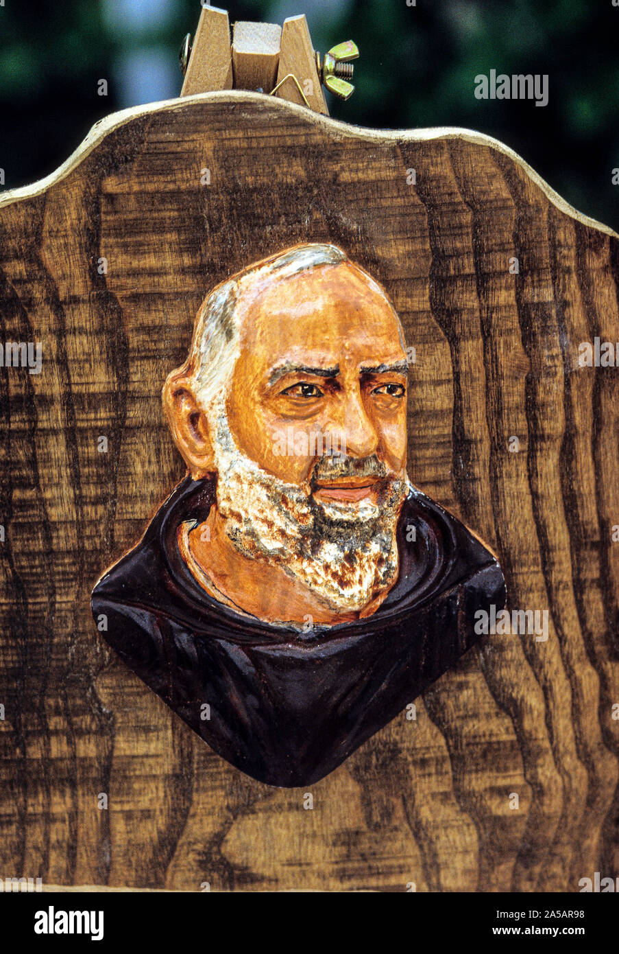 Italy Lombardy Barlassina ( Mi ) - wooden Bas-rilief depicting  San Pio Stock Photo