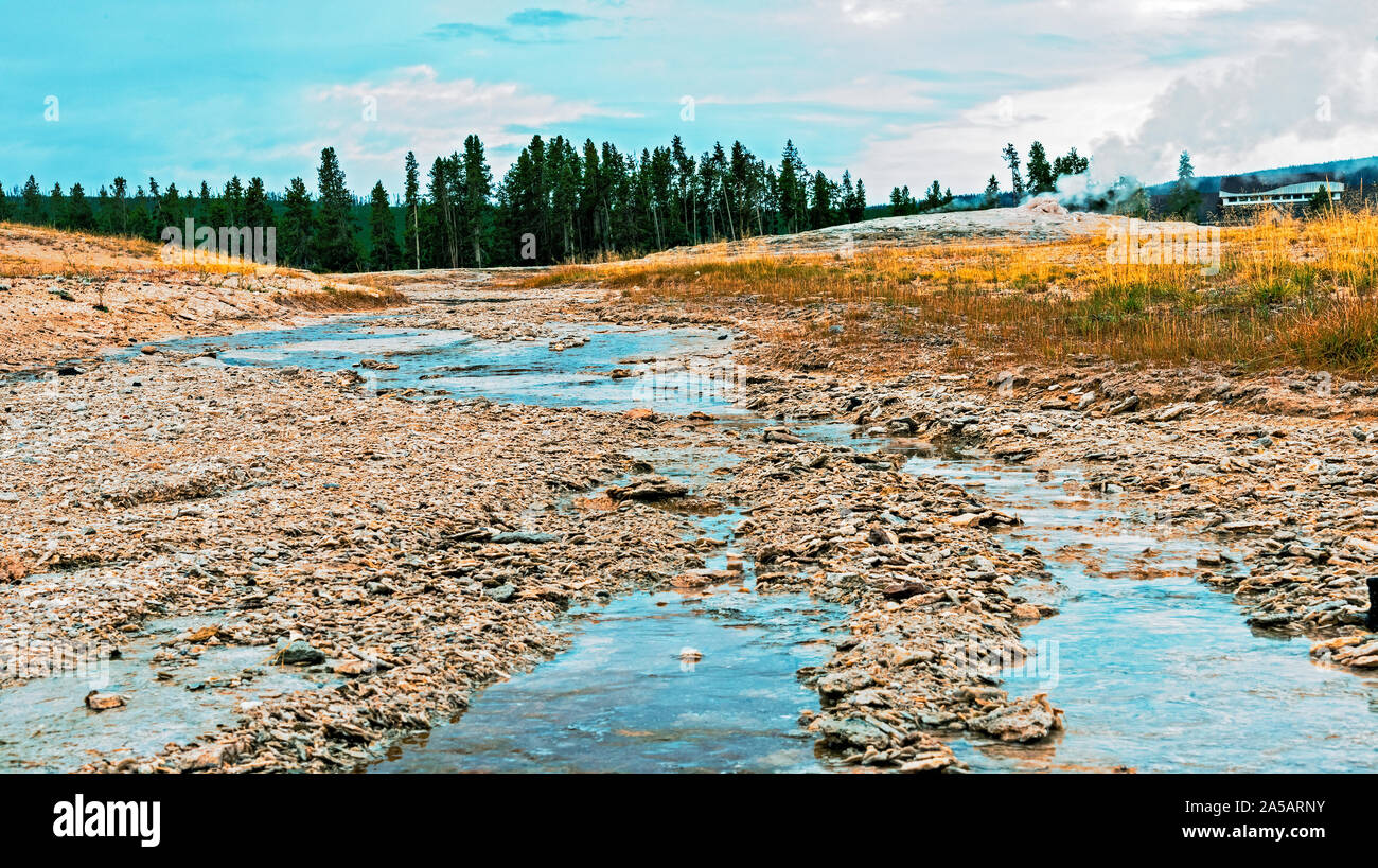 Blue water running down from geyser. Stock Photo