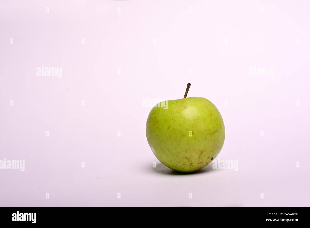 Green Apple isolated on white background Stock Photo - Alamy