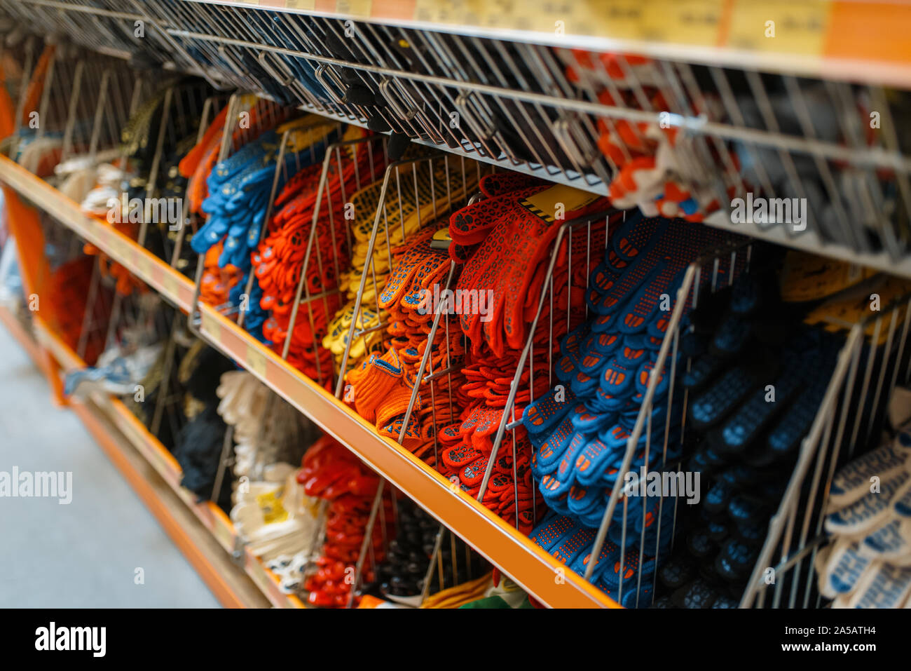 Hardware store assortment, shelf with gloves Stock Photo Alamy