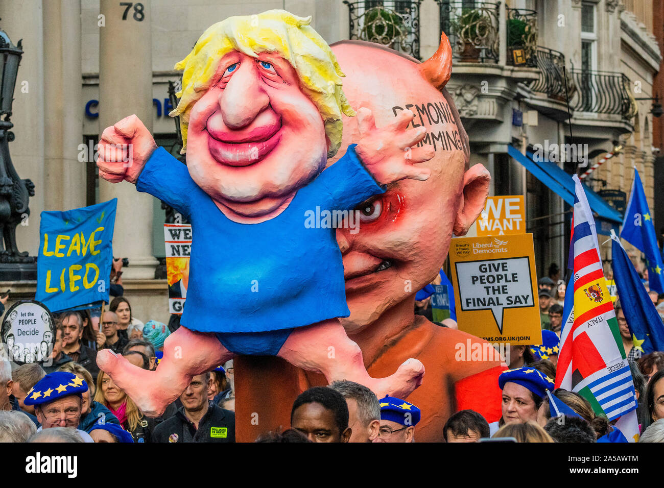 London, UK. 19th Oct, 2019. Effigies of Boris Johnson being operated like a puppet by Dominic Cummings - Stop Brexit, people's vote march from the west end to Westminster. Credit: Guy Bell/Alamy Live News Stock Photo