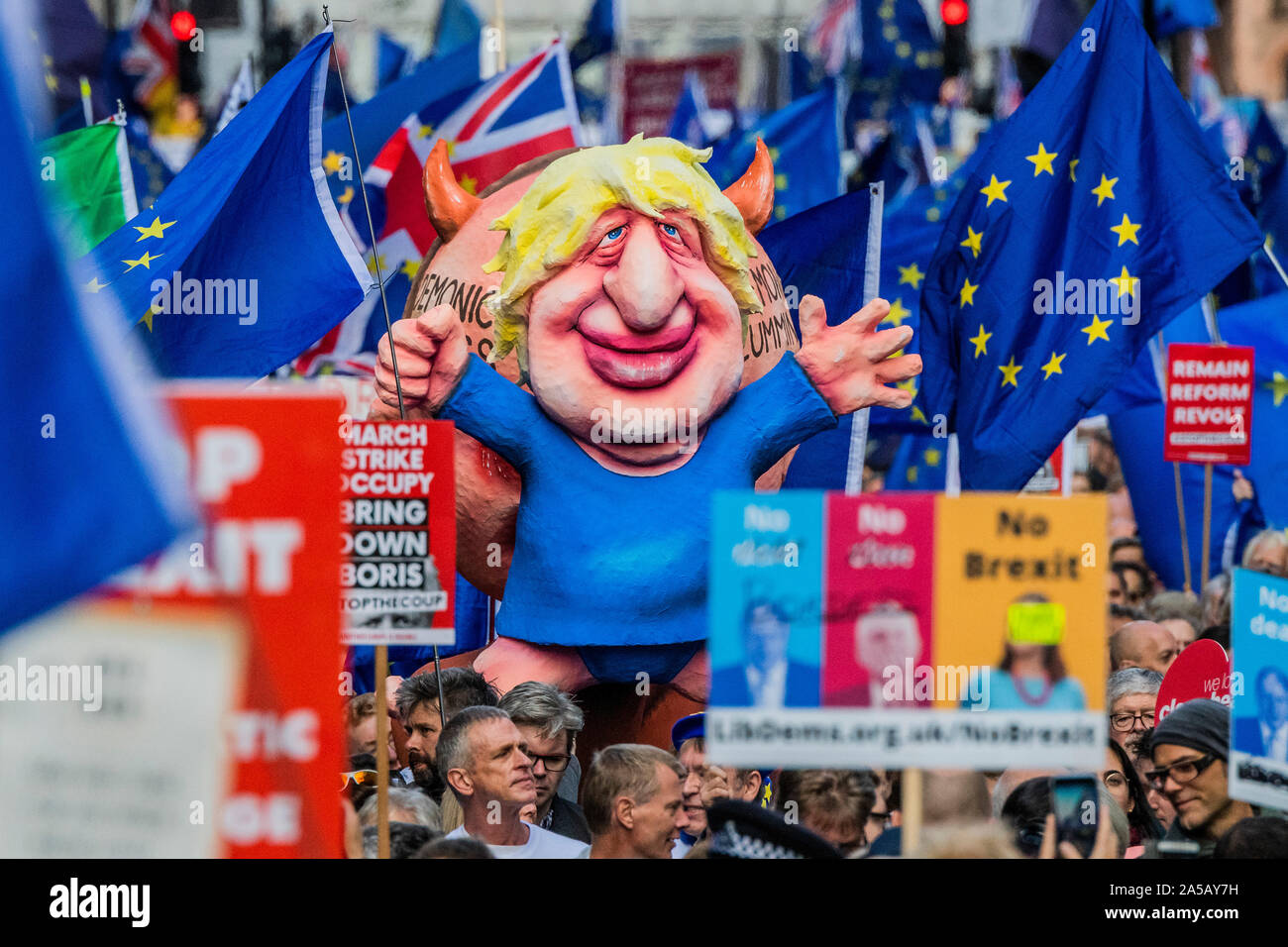 London, UK. 19th Oct, 2019. Effigies of Boris Johnson being operated like a puppet by Dominic Cummings - Stop Brexit, people's vote march from the west end to Westminster. Credit: Guy Bell/Alamy Live News Stock Photo