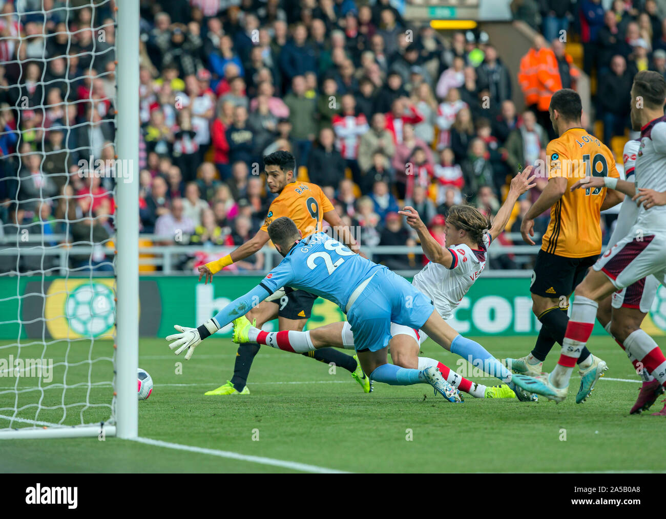 Wolverhampton, UK. 19th Oct, 2019. ; Molineux Stadium, Wolverhampton, West Midlands, England; English Premier League Football, Wolverhampton Wanderers versus Southampton; Raul Jimenez of Wolverhampton Wanderers scoring past Angus Gunn of Southampton in the 42nd minute but after inspection by the Video Assistant Referee Kevin Friend Referee Peter Bankes rules the goal as disallowed - Strictly Editorial Use Only. No use with unauthorized audio, video, data, fixture lists, club/league logos or 'live' services. Online in-match use limited to 120 images, no video emulation. No use in betting, games Stock Photo
