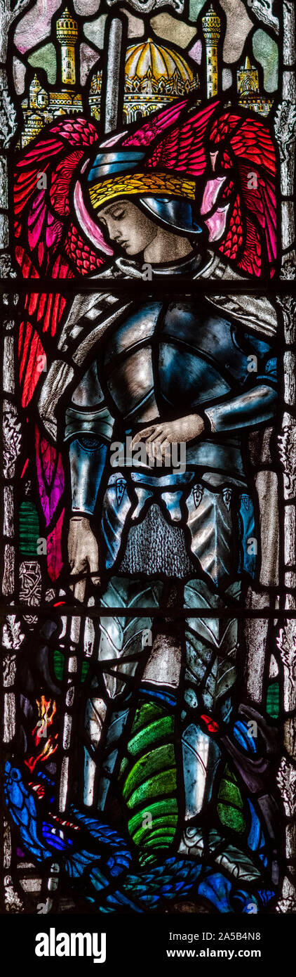 Christopher Whalls (1923) depiction of St. Michael overcoming the dragon, St. Leonards Church, Middleton, Greater Manchester, UK Stock Photo