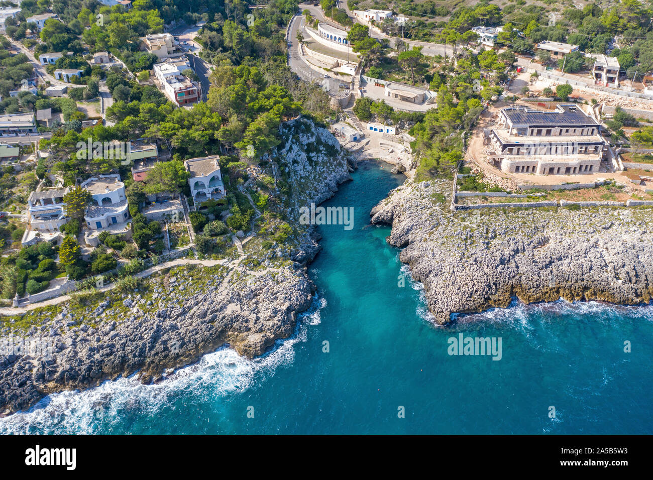 Aerial view of the idyllic beach and bay Cala dell'Acquaviva at Castro, Lecce, Apulia, Italy Stock Photo