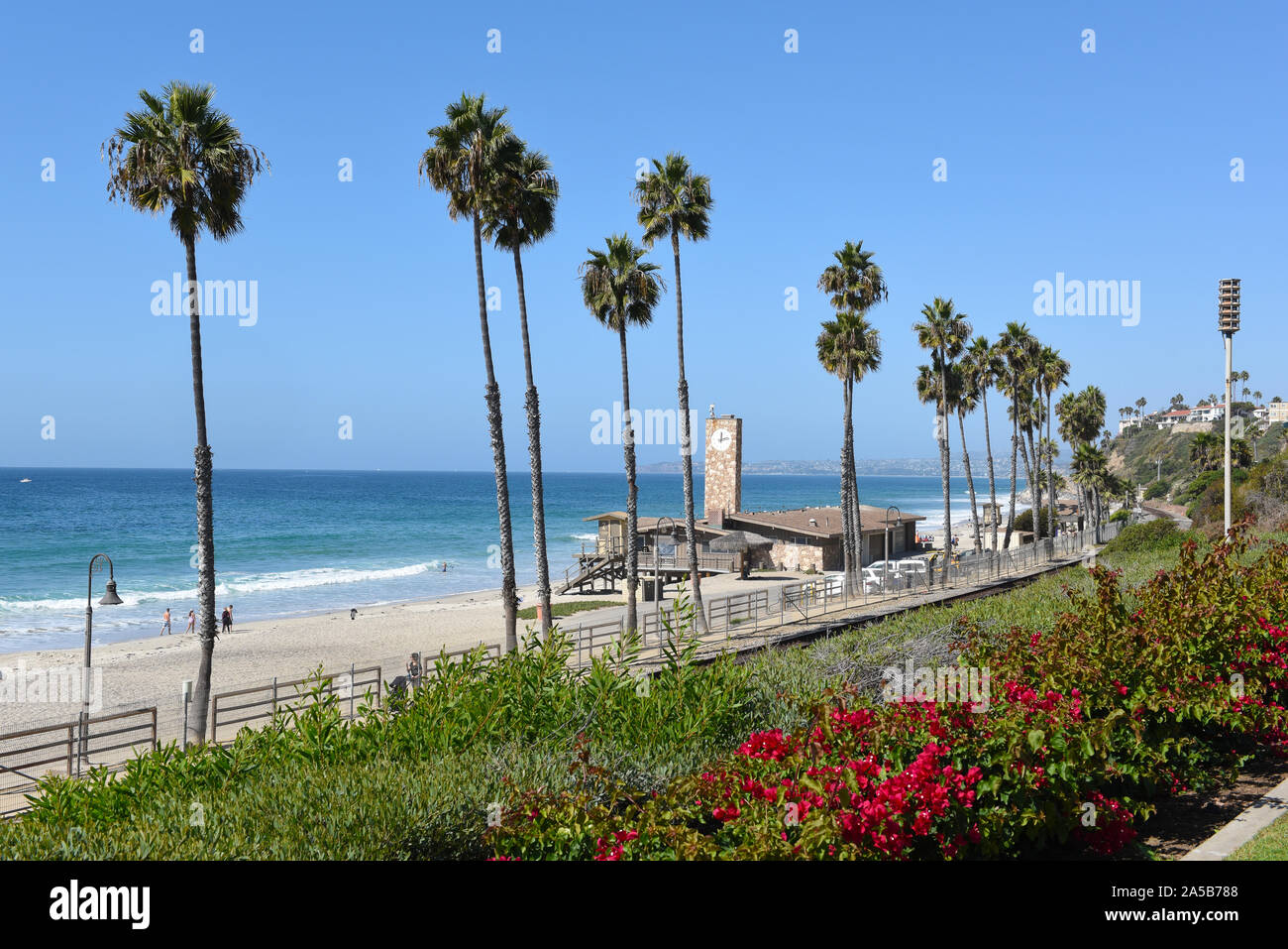 SAN CLEMENTE, CALIFORNIA - 18 OCT 2019: The ocean and beach seen from Parque del Mar with clock tower and train tracks. Stock Photo