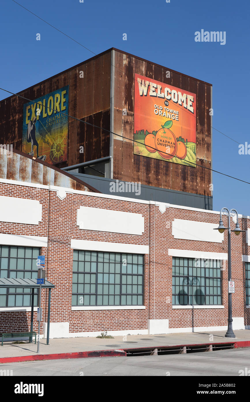 ORANGE, CALIFORNIA - 14 OCT 2019: Welcome to Old Towne Orange Sign atop building, vertical orientation. Stock Photo