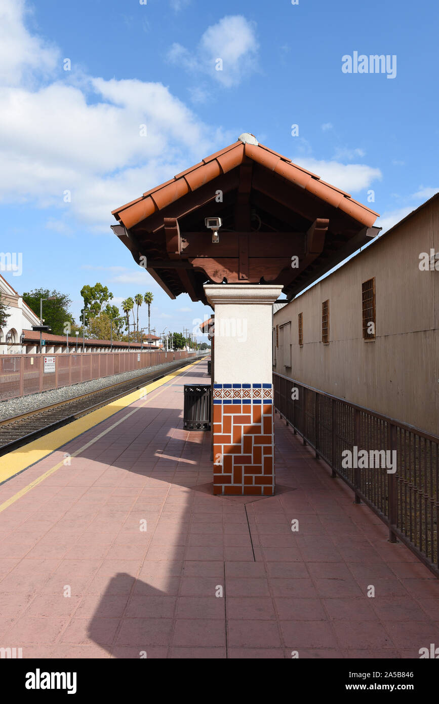 SANTA ANA, CALIFORNIA - 14 OCT 2019: The northbound platform at the Sant Ana Train Station, vertical orientation. Stock Photo