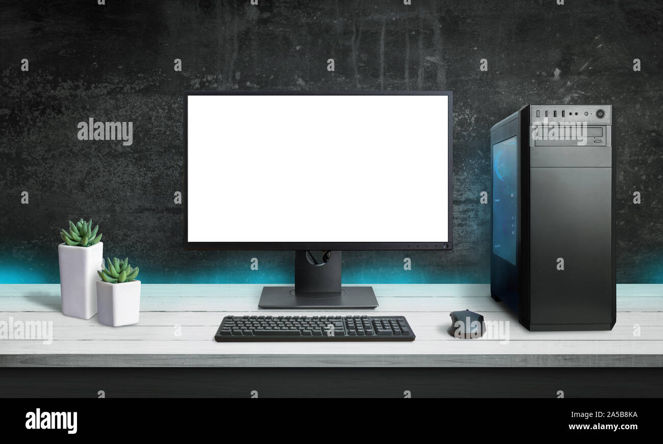 Gaming PC mockup. Modern case with blue RGB light. Black wall in background. Stock Photo