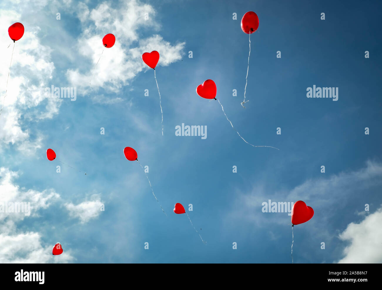 Balloon heart in the sky hi-res stock photography and images - Alamy