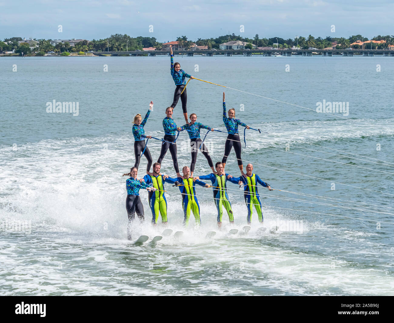 The Sarasota Ski-A-Rees Water Ski team preforming in Sarasota Bay in Sarasota Florida Stock Photo