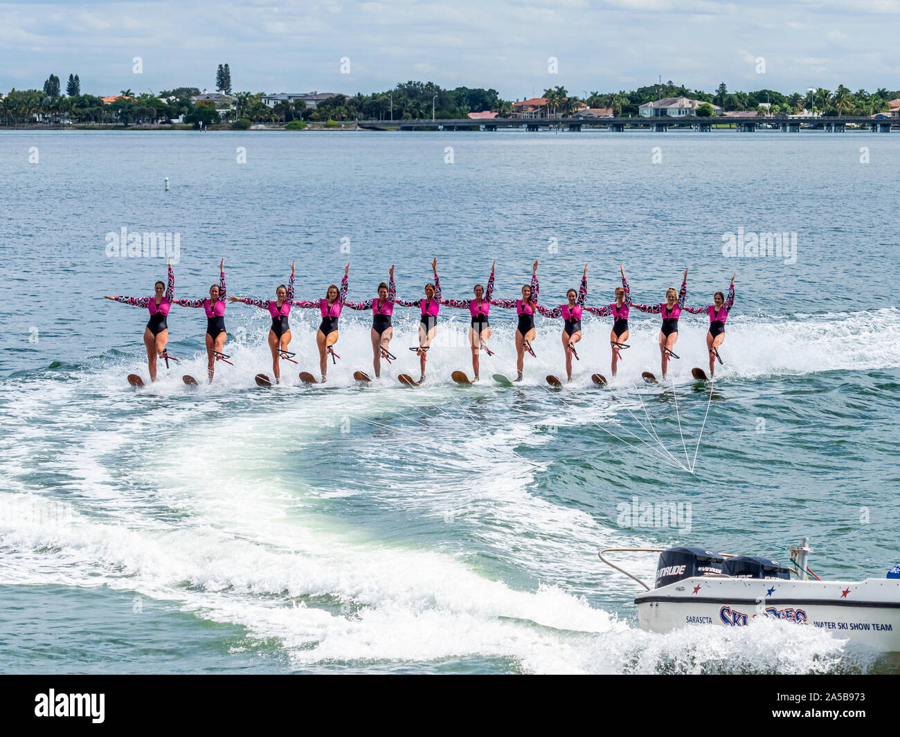 The Sarasota Ski-A-Rees Water Ski team preforming in Sarasota Bay in Sarasota Florida Stock Photo