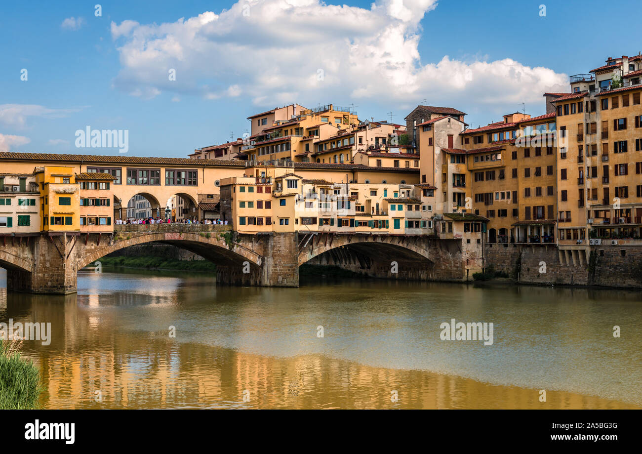 Ponte Vecchio (Old Bridge) in Florence, Tuscany, Italy. This medieval stone bridge that spans river Arno, consists of three segmental arches and it ha Stock Photo