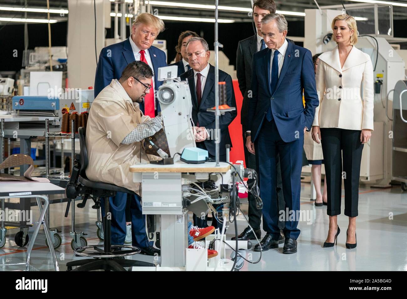 U.S President Donald Trump tours the newly opened Louis Vuitton Workshop Rochambeau October 17, 2019 in Alvarado, Texas. Joining the president from left to right are: are Michael Burke of LVMH, Alexandre Arnault, Bernard Arnault, chief executive of LVMH, and Ivanka Trump. Stock Photo