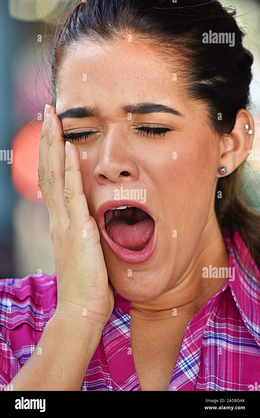 Woman wearing pink shirt hi-res stock photography and images - Alamy