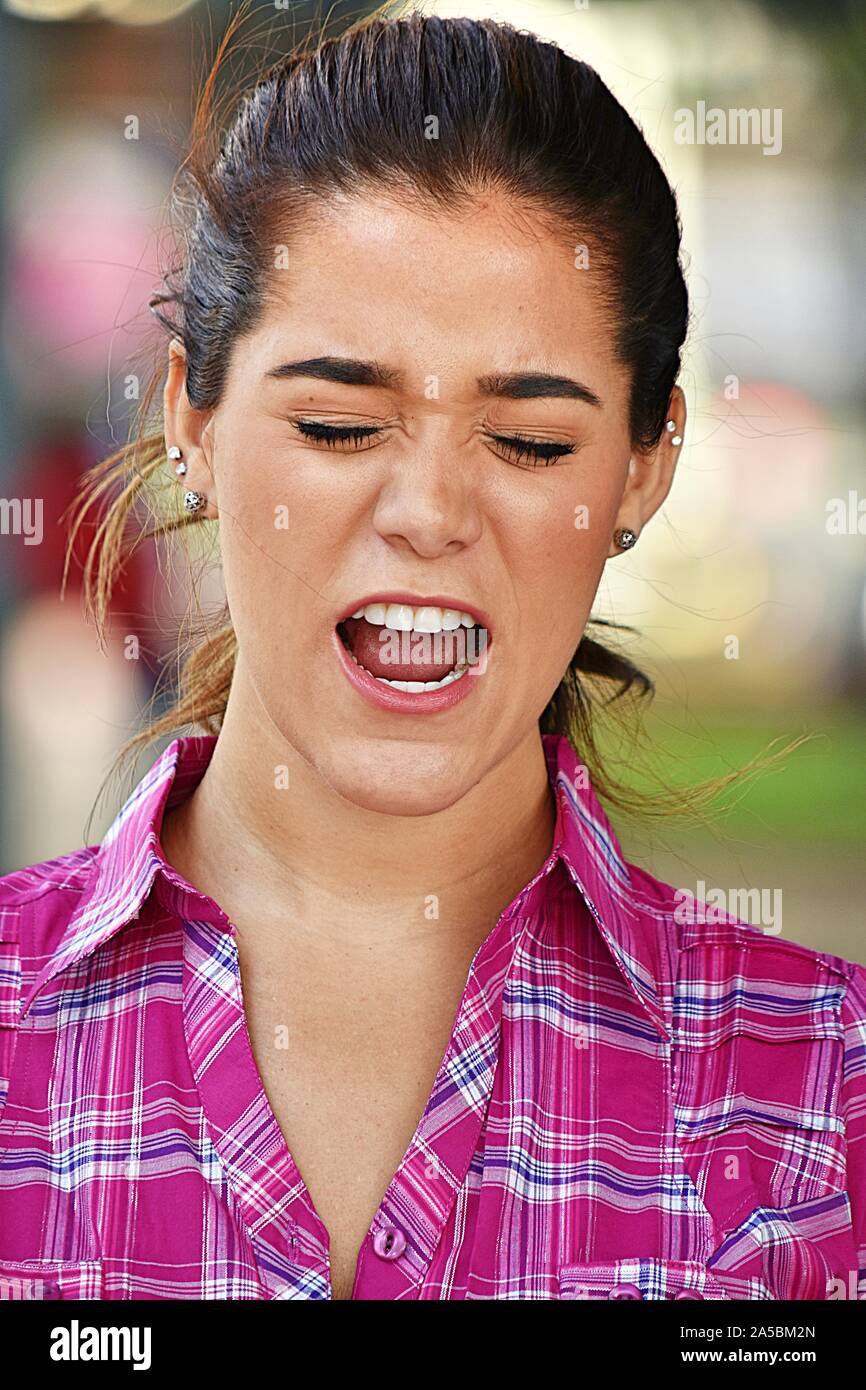 Woman wearing pink shirt hi-res stock photography and images - Alamy