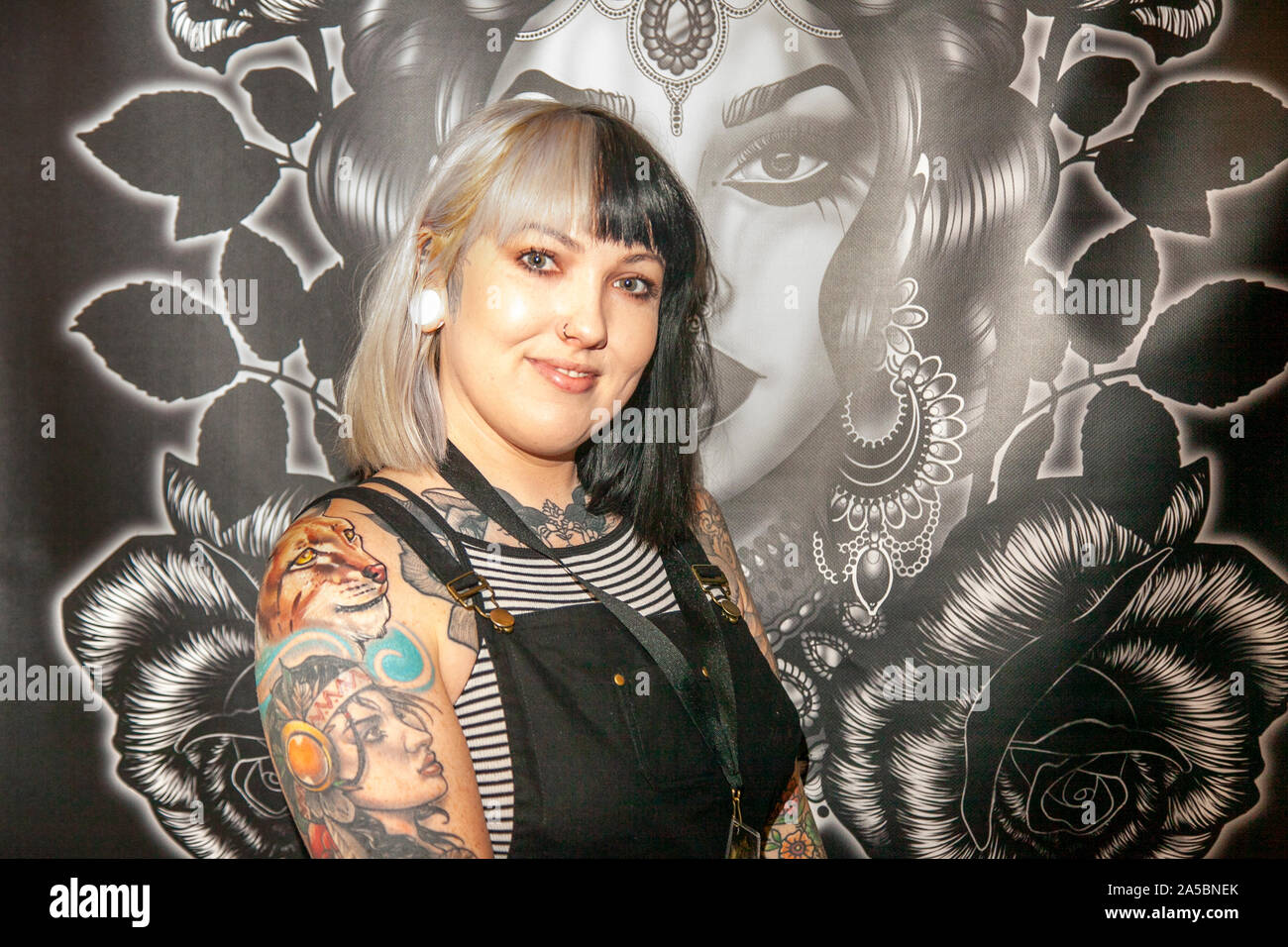 Female body tattoos in Liverpool, Merseyside, UK. UK Entertainment. 19th  October, 2019. Beth Maher tattoo artist; body tattoos at the Adelphi  International Tattoo Covention. UK national and international tattoo artists,  staging the
