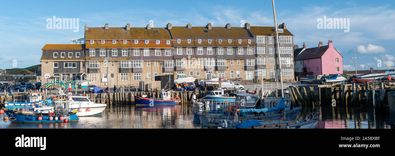 Panoramic photo of Pier Terrace in West bay in Dorset. Stock Photo