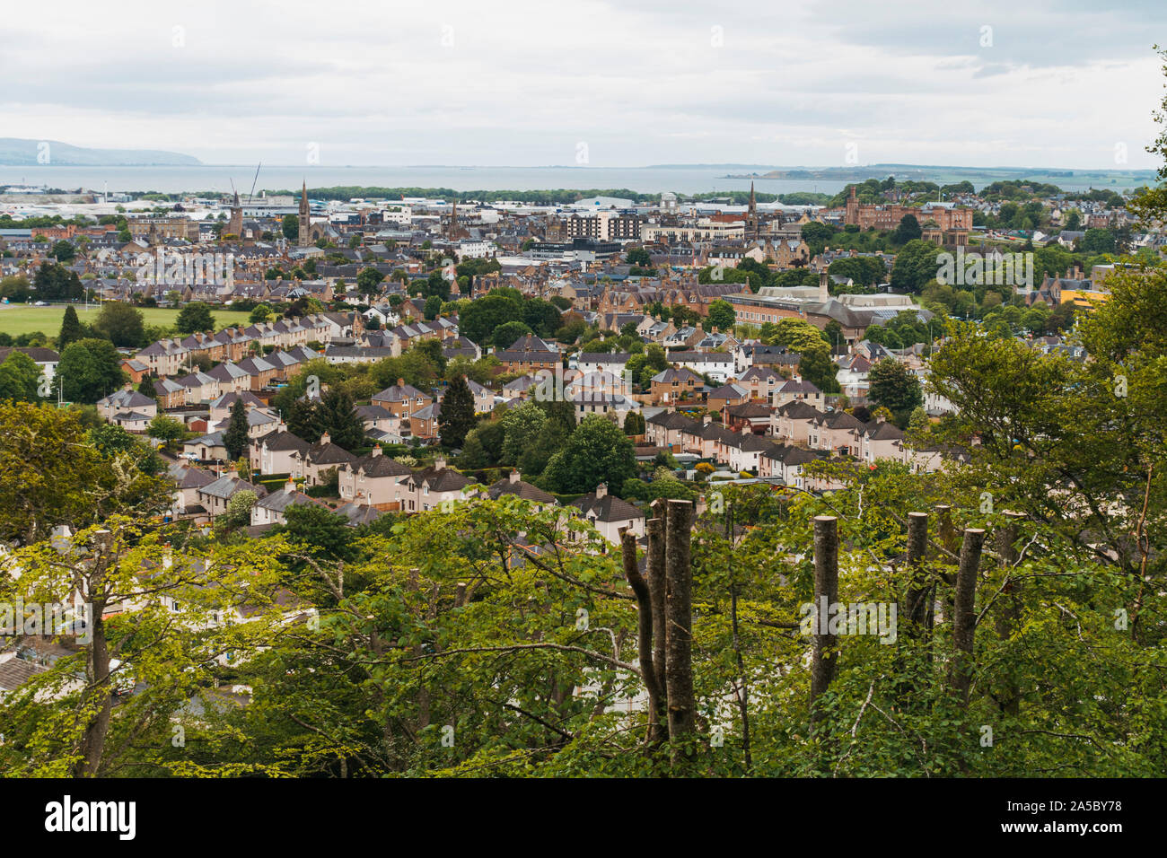 Looking out over the city of Inverness on a cloudy day from on top of Tomnahurich Cemetery Hill Stock Photo
