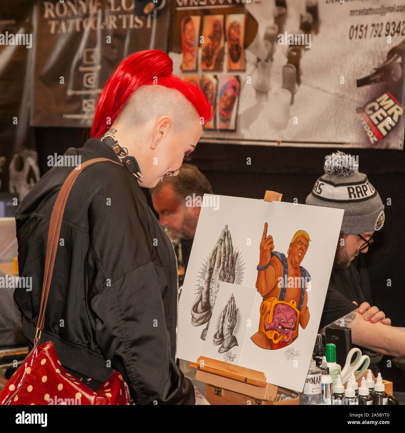 Liverpool, Merseyside, UK. 19th October, 2019. Body tattoos at the Adelphi International Tattoo Covention.  UK national and international tattoo artists, staging the UK Tattoo Awards, tattoo competitions. Organised by Liverpool tattoo studio ‘Design 4 Life’, the Liverpool Tattoo Convention is regarded as a must-attend and well respected show in the industry, honouring tattoo culture, lifestyle and art. Credit: MediaWorldImages/AlamyLiveNews Stock Photo