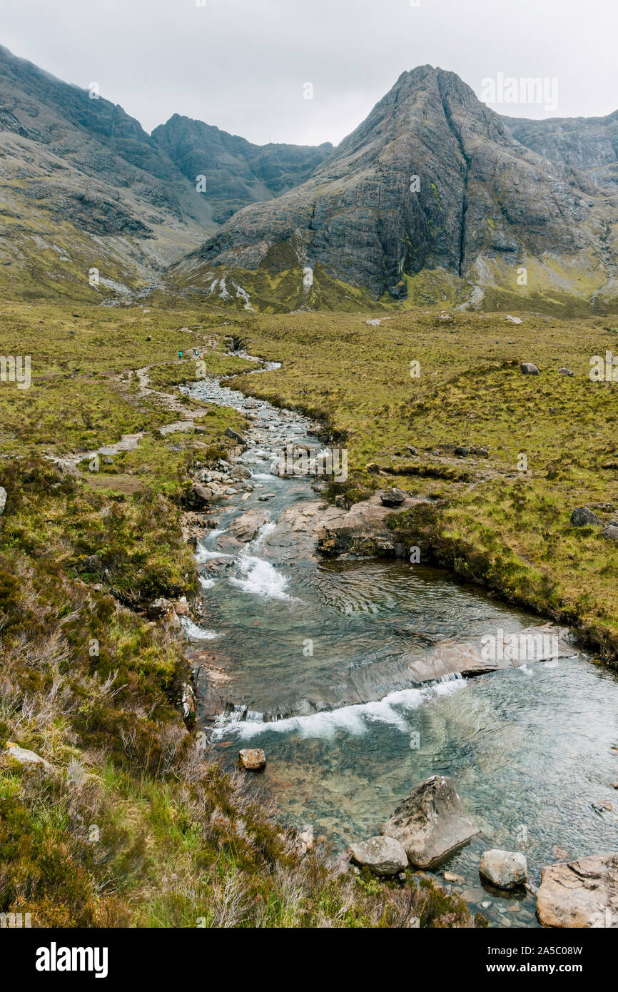 Looking upstream toward the Black Cuillin mountain range at the Fairy Pools, on the Isle of Skye, Scotland, UK Stock Photo