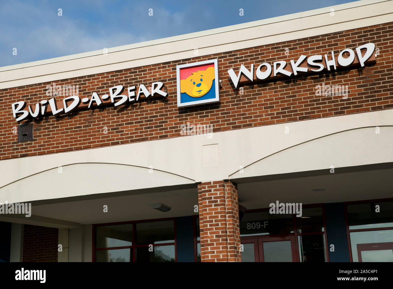 A logo sign outside of a Build-A-Bear Workshop retail store location in Greensboro, North Carolina on September 15, 2019. Stock Photo
