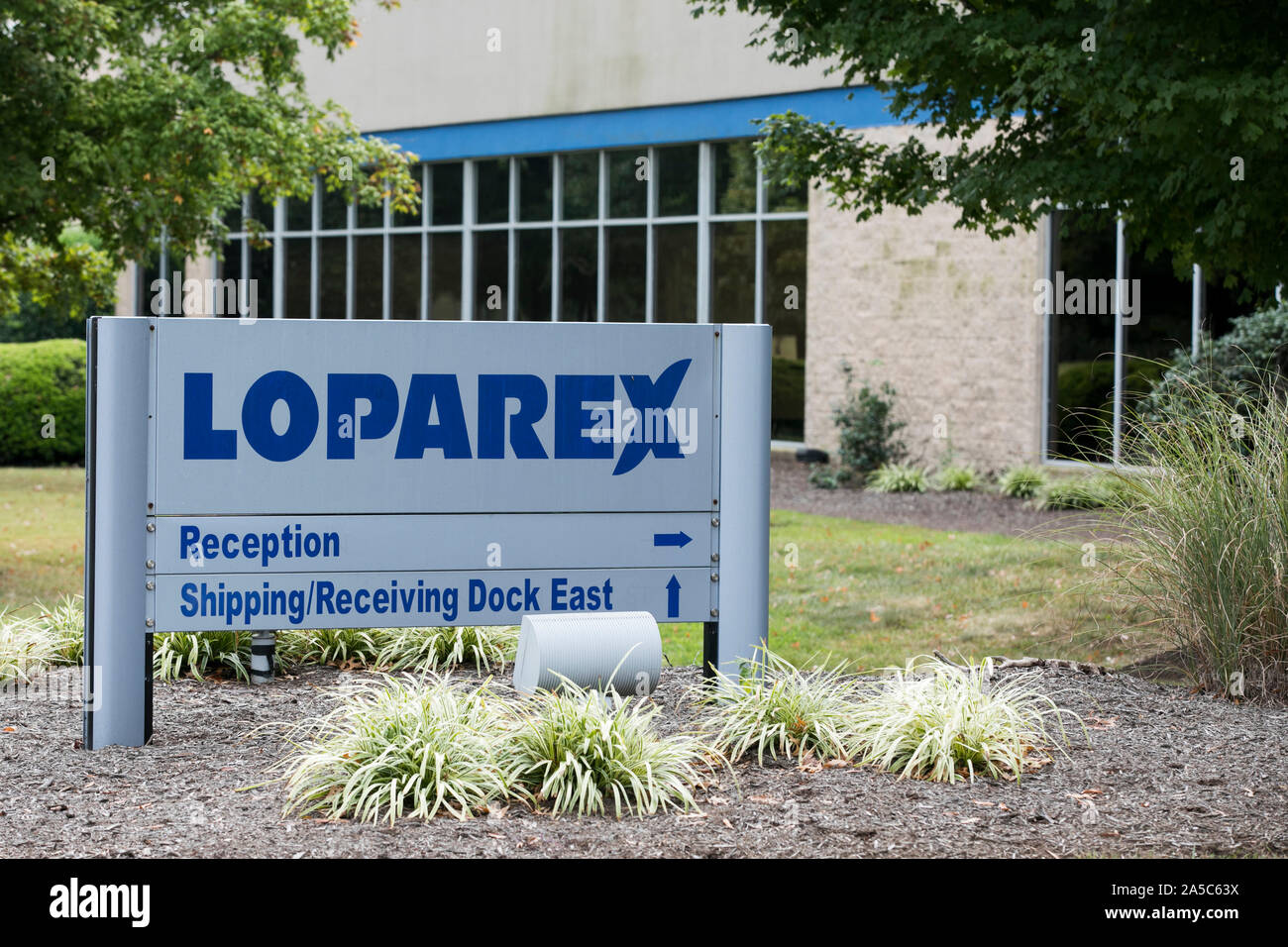 A logo sign outside of a facility occupied by Loparex in Eden, North