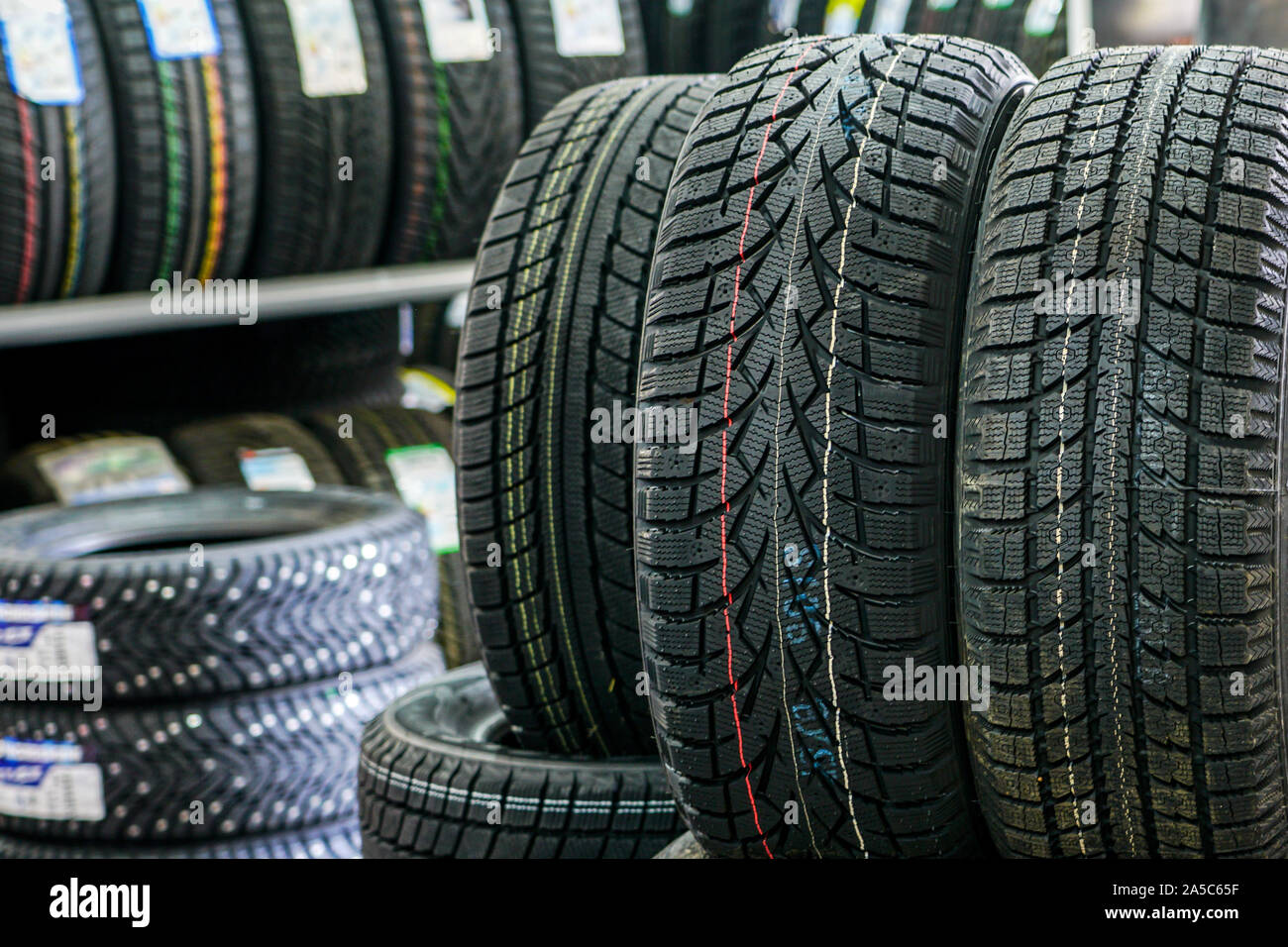 new winter tires without studs at tire shop Stock Photo