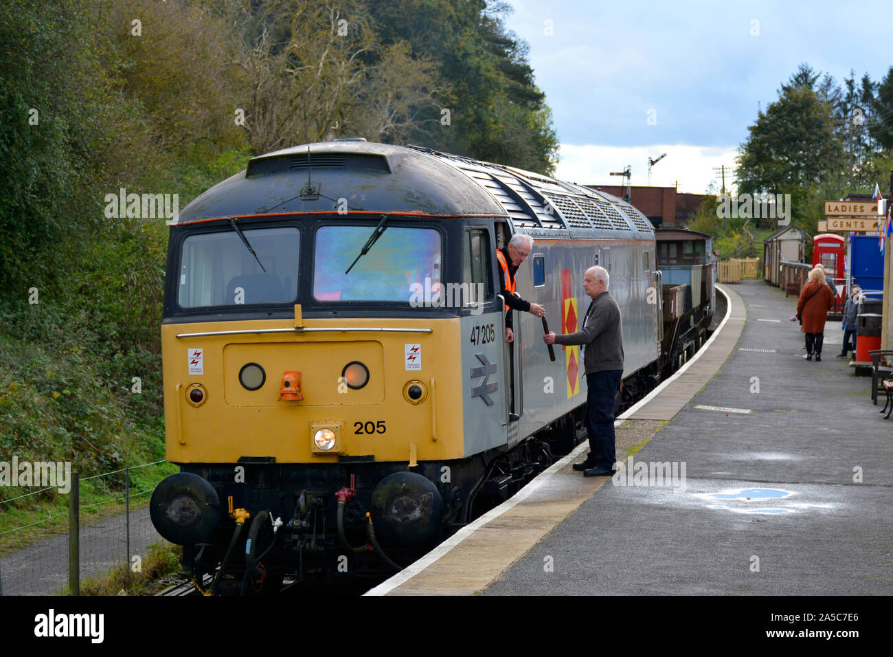 Class 47 locomotive 47205 driver exchanging token with signaller at the Northampton and Lamport Railway Autumn Gala, October 2019 Stock Photo