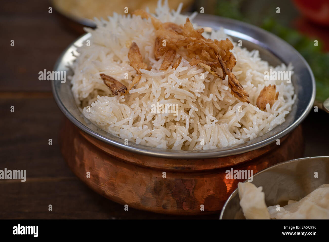 Vegetarian Indian basmathi rice fried with ghee, topped with crispy onions Stock Photo