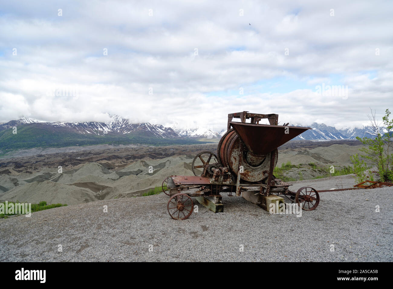 Relics of the  abandoned mining camp Kennicott, in the rear Root Glacier Moraines, Wrangell Mountains, Alaska Stock Photo
