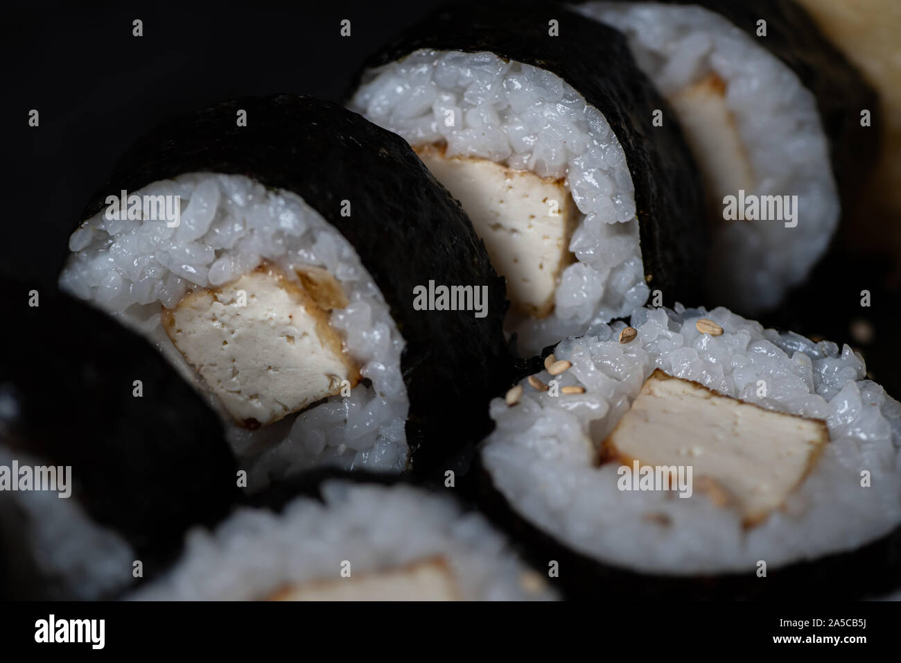 Vegan maki sushi filled with marinated tofu Stock Photo Alamy