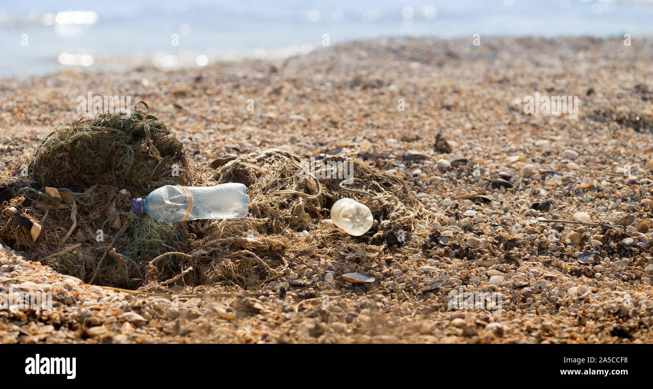 Fishing net with plastic garbage pollution on seaside Stock Photo Alamy